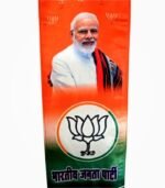 Close-up of BJP muffler print with party leader and lotus symbol