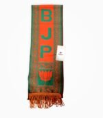 BJP muffler folded with fringe and lotus design visible