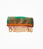 Rolled BJP campaign muffler in orange and green weave
