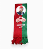 Folded red and green Samajwadi Party muffler with Akhilesh Yadav's photo and bicycle symbol.