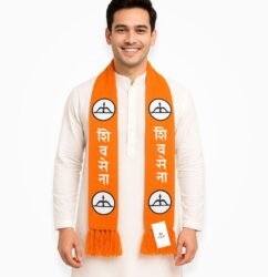 "Orange muffler with printed design worn by an Indian male model in white kurta pajama"