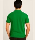 Back view of plain green collared polo t-shirt on Indian male model