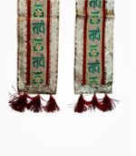 Close-up of Radhe Radhe Red Phatka showing embroidery and tassels