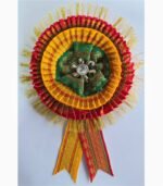 Close up front view of zari ribbon badge 2 layer red yellow satin flower with zari fringe border
