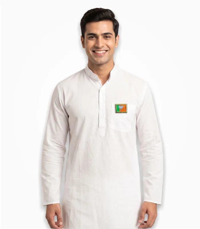Rectangular BJP metal badge with saffron-green flag design and golden border pinned on a white kurta