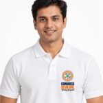 Male model wearing a white Congress Seva Dal Young Brigade polo T-shirt with a small logo on the left chest.