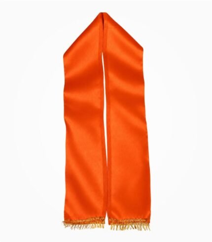 in orange satin patka with narrow golden lace and fringe at both ends