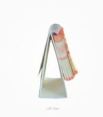 Side view of the Shubh Vichar table calendar showing its triangular white stand and hanging pages